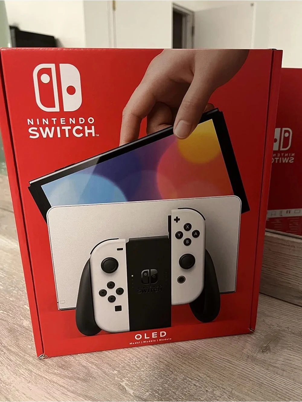 Nintendo OLED Console with White and Black Joy‑Con